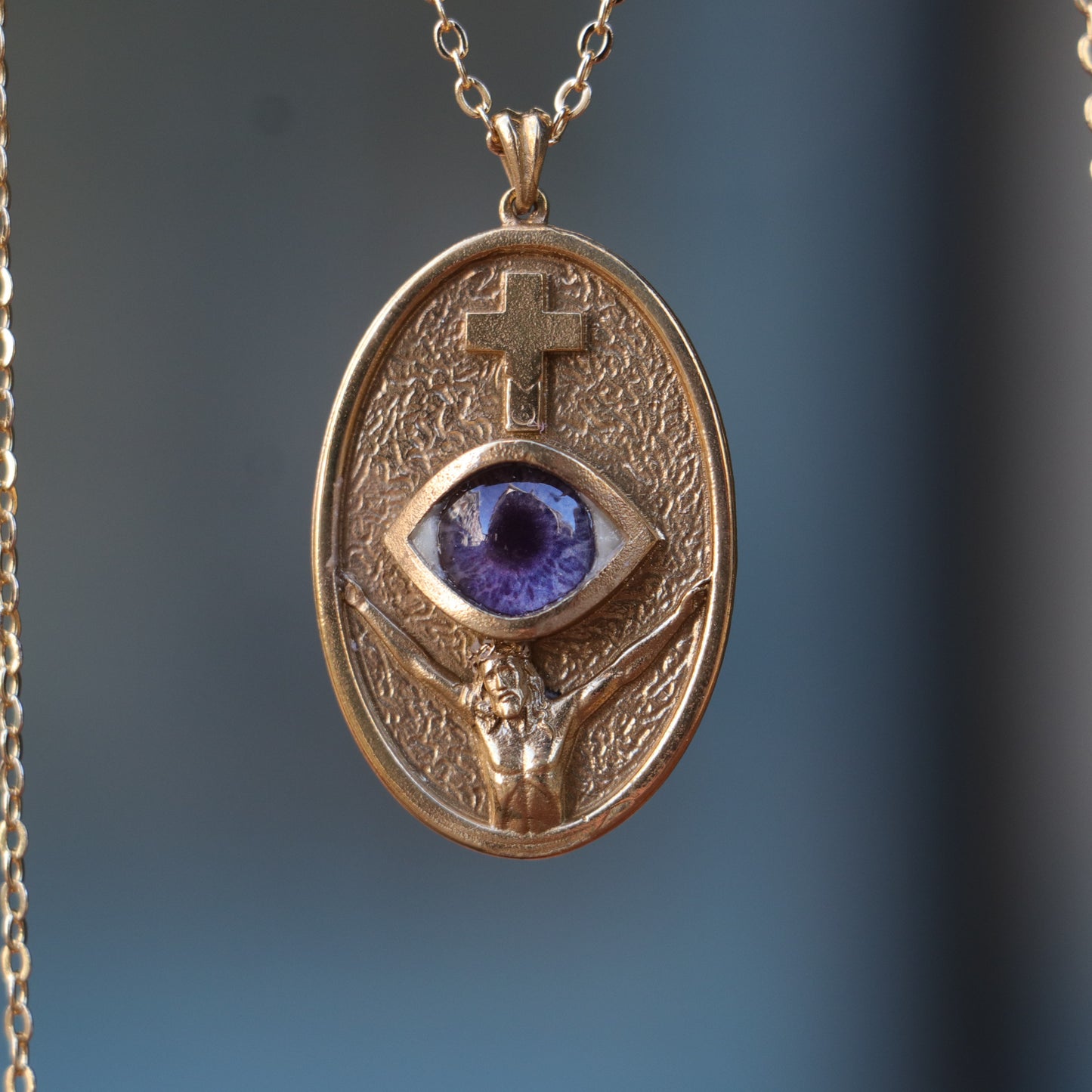 Jesus Christ and the Cross Blue Eye Necklace