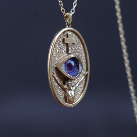 Jesus Christ and the Cross Blue Eye Necklace