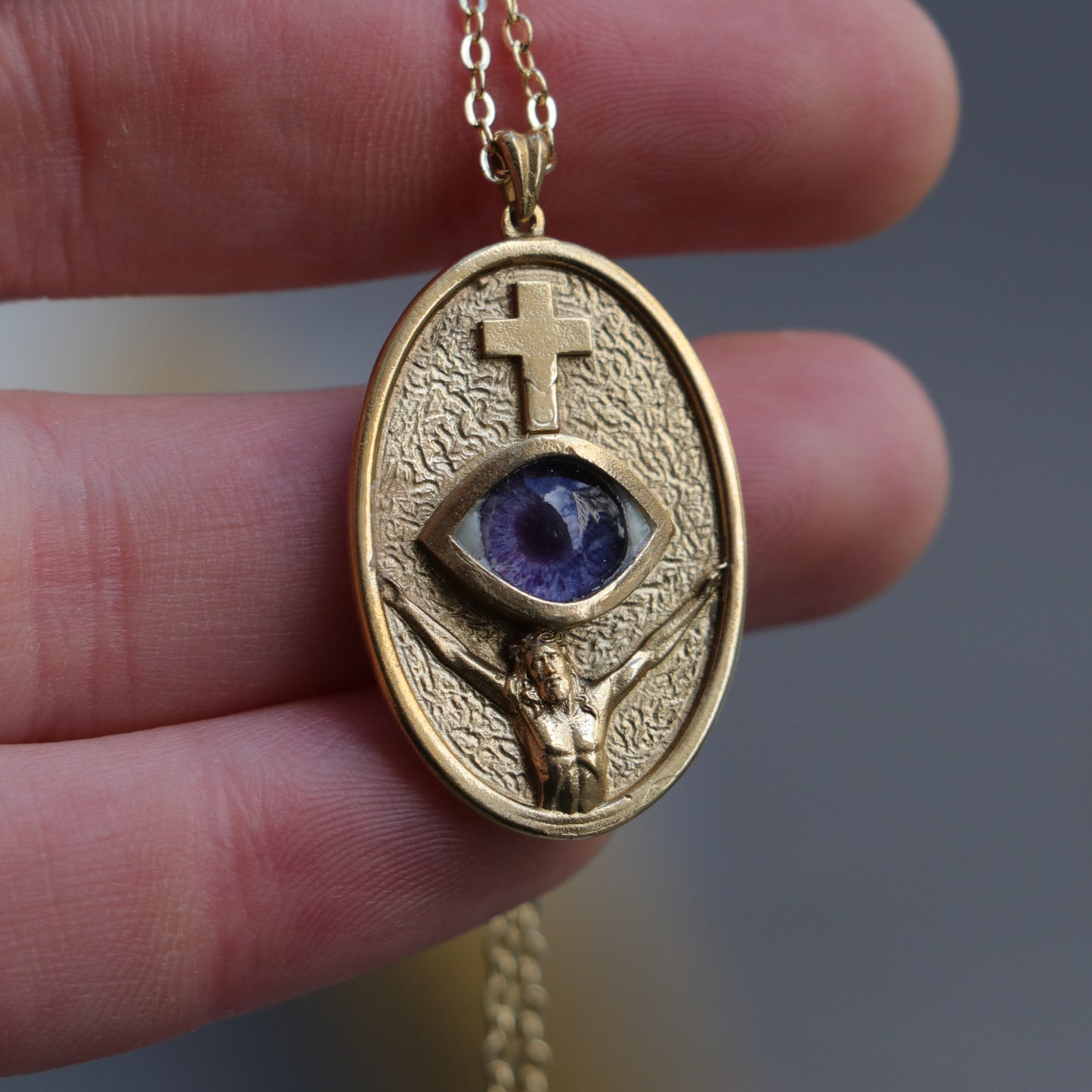 Jesus Christ and the Cross Blue Eye Necklace