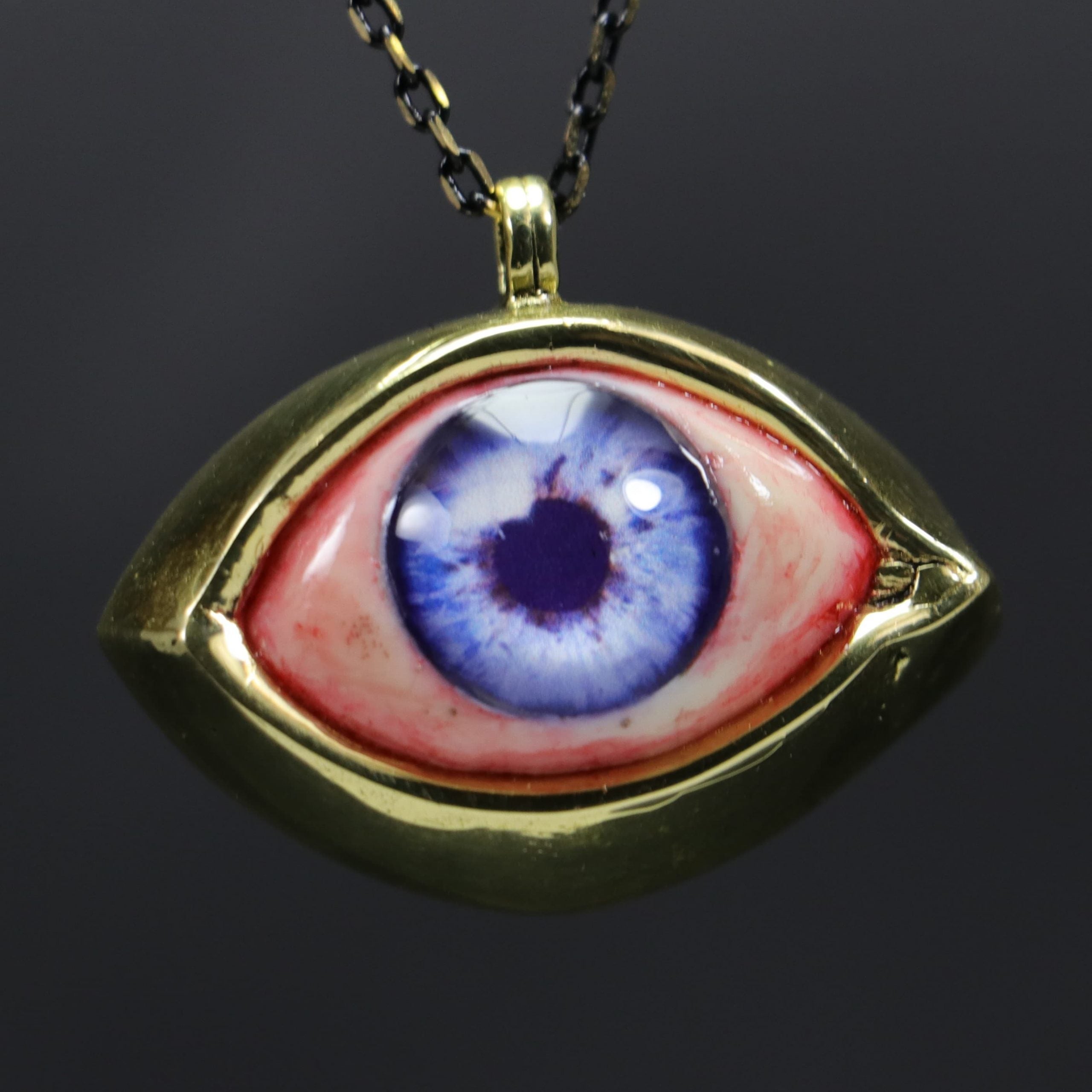 Amazon.com: Little Gem Girl Blue Orange Cat Eye Necklace in Gunmetal Finish  - Dragon Eye Pendant - Evil Eye Glass Eye Jewelry : Clothing, Shoes &  Jewelry